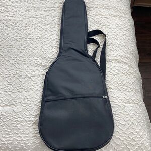 Fender Squier Stratocaster black. With fender auto clip tuner and two picks.